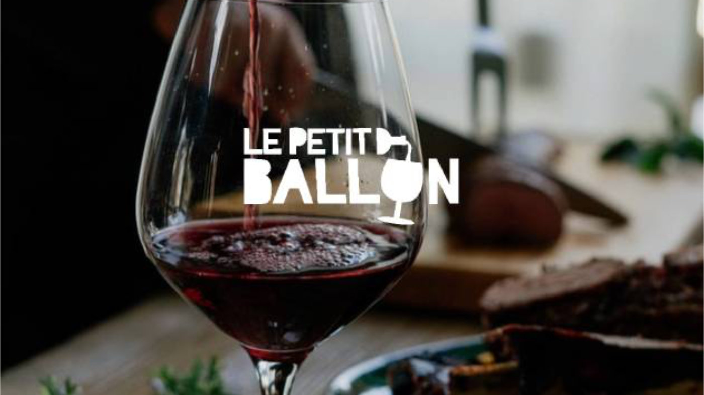 Le Petit Ballon — a glass of red wine being poured, with the brand's logo